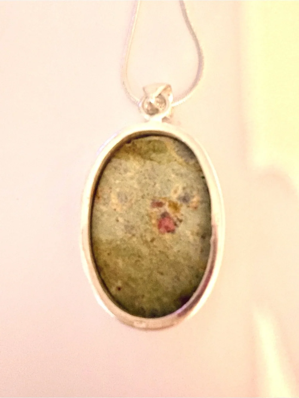 Beautiful, handcrafted, 2 inch Ruby Zoisite pendant on a silver chain.